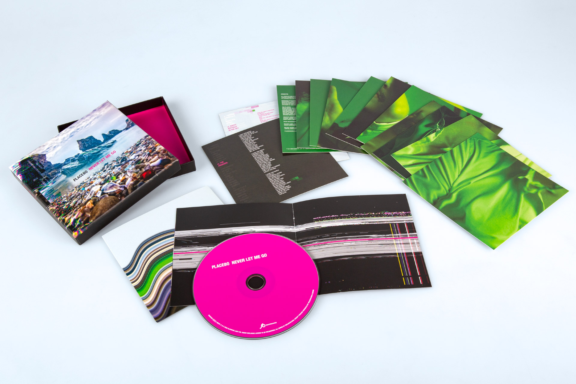Placebo - Never Let Me Go. Groove Attack | Elevator Lady: CD box set with lift of lid box, CD slipcase, 13 lyric cards and booklet