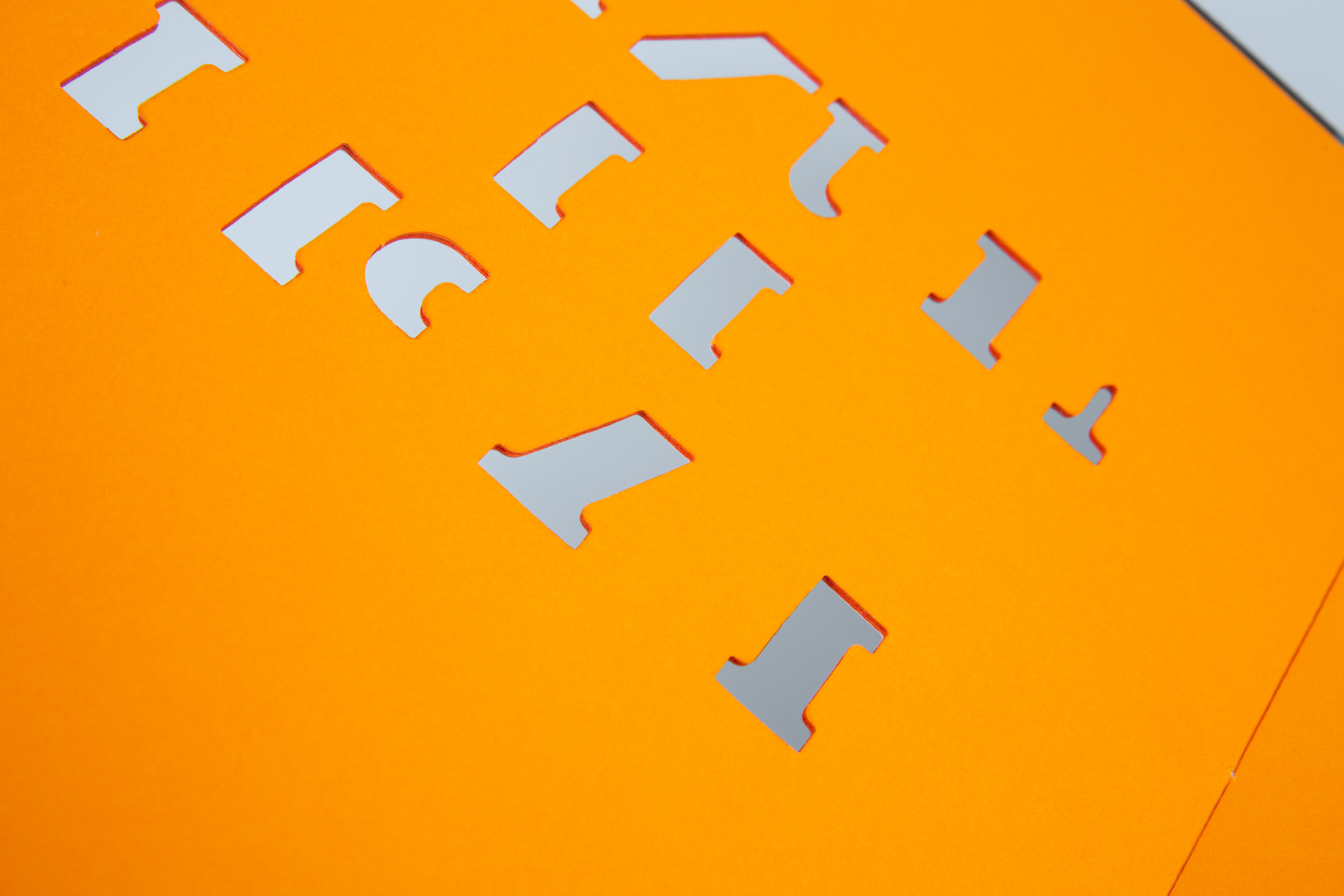 Mundo de Papel | Mack Books: Natural paper dyed through in orange